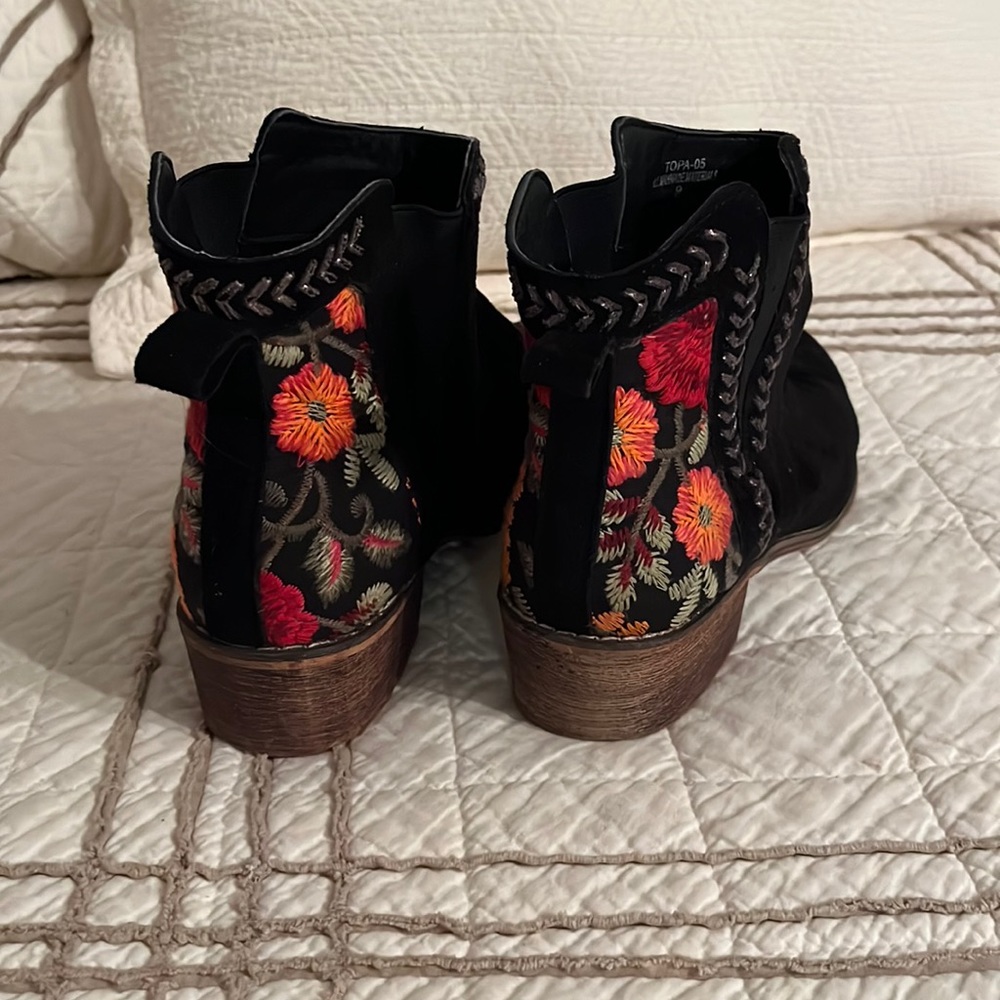 Black BoHo bootie with embroidered heels. These booties are AMAZING.